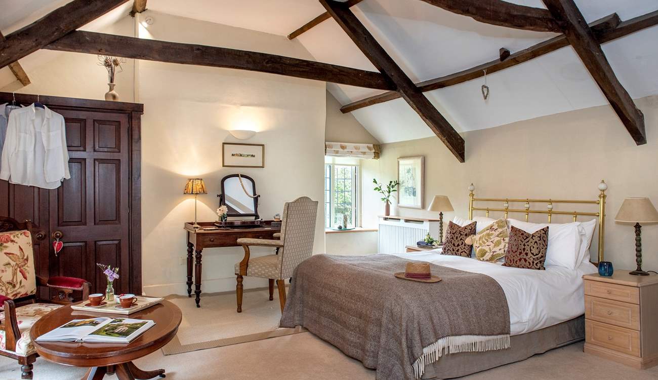 Gorgeous bedroom 2 has a fabulous king-size bed and an en suite shower-room.