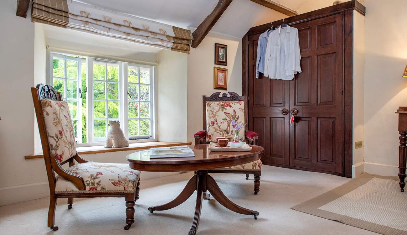 The charming sitting area in bedroom 2.