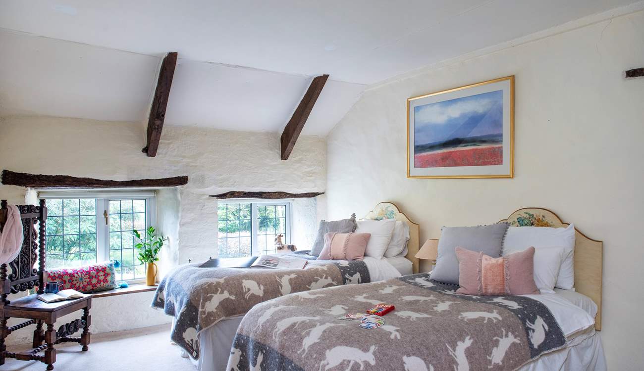 Bedroom 4 is a pretty twin bedded room and ideal for either adults or children. Access to bedroom 5 is through this room. Please mind your head when stepping down into bedroom 4 from the hallway.