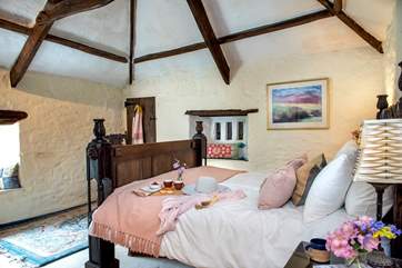 Characterful bedroom 5 has a king-size bed and is accessed via bedroom 4.