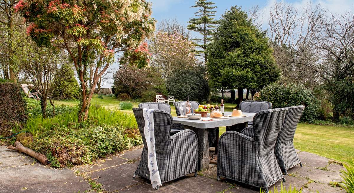 Enjoy al fresco dining overlooking the gorgeous gardens.