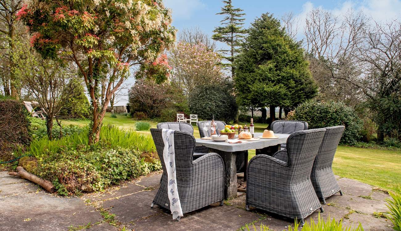 Enjoy al fresco dining overlooking the gorgeous gardens.