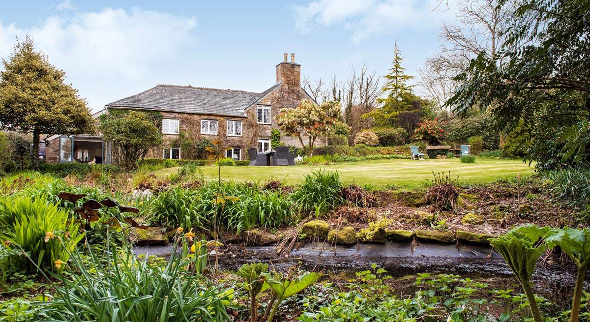 The pond is at the bottom of the garden, please supervise children at all times.