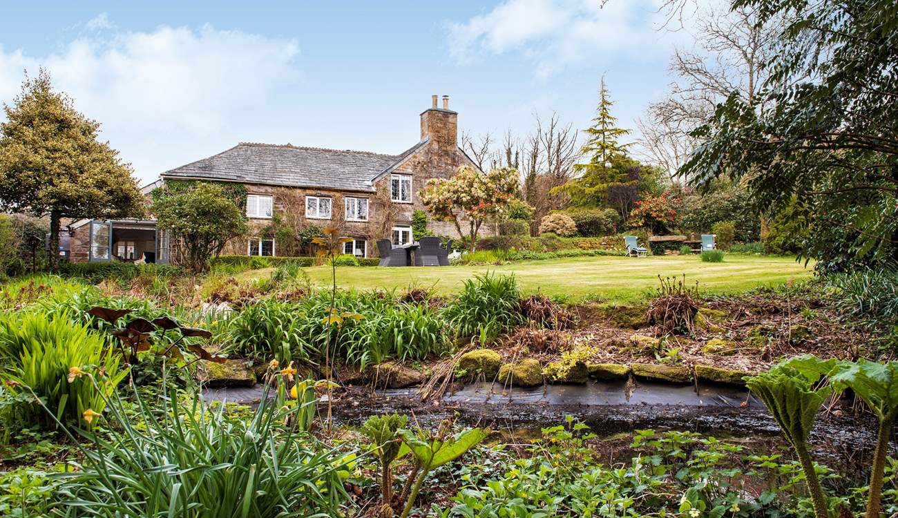 The pond is at the bottom of the garden, please supervise children at all times.