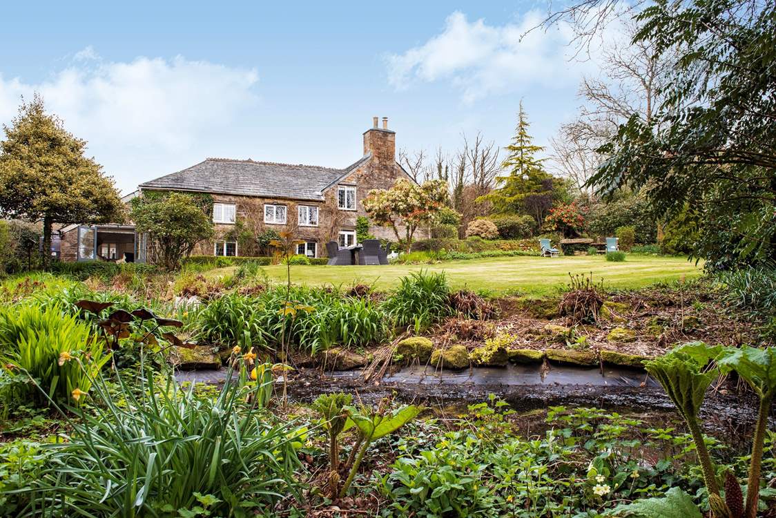 The pond is at the bottom of the garden, please supervise children at all times.