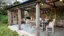 The delightful outside space for al fresco dining whatever the weather. 