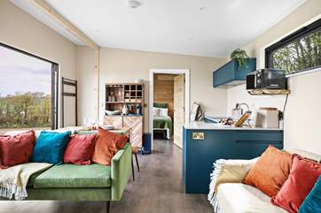 Gorgeous interiors are complemented by rich jewel coloured furnishings.