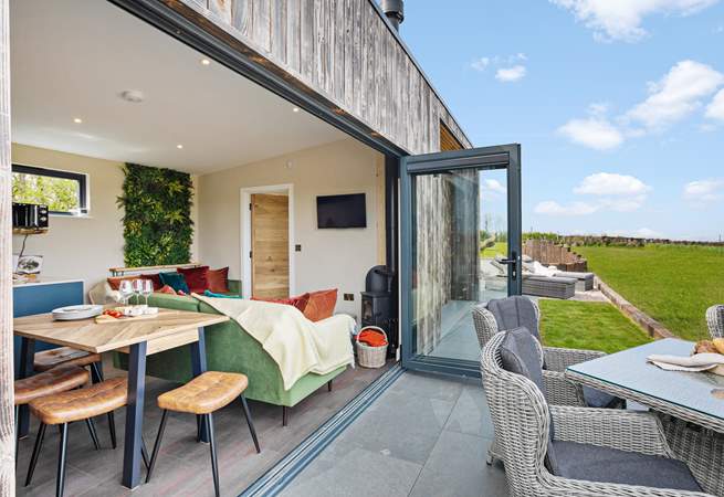 Opening up the bi-fold doors will double the size of your living space.