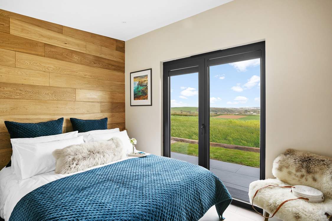 Sink into the sumptuous king-sized bed and admire the far-reaching views.
