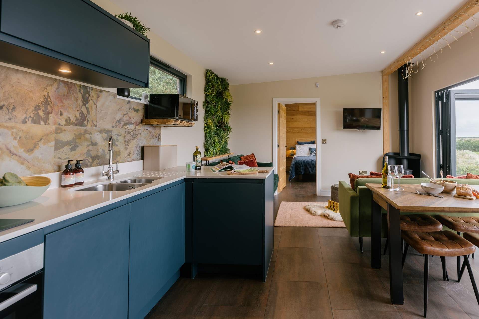 Where the open-plan living space allows for the natural light to stream in. 