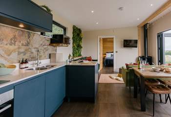 Where the open-plan living space allows for the natural light to stream in. 