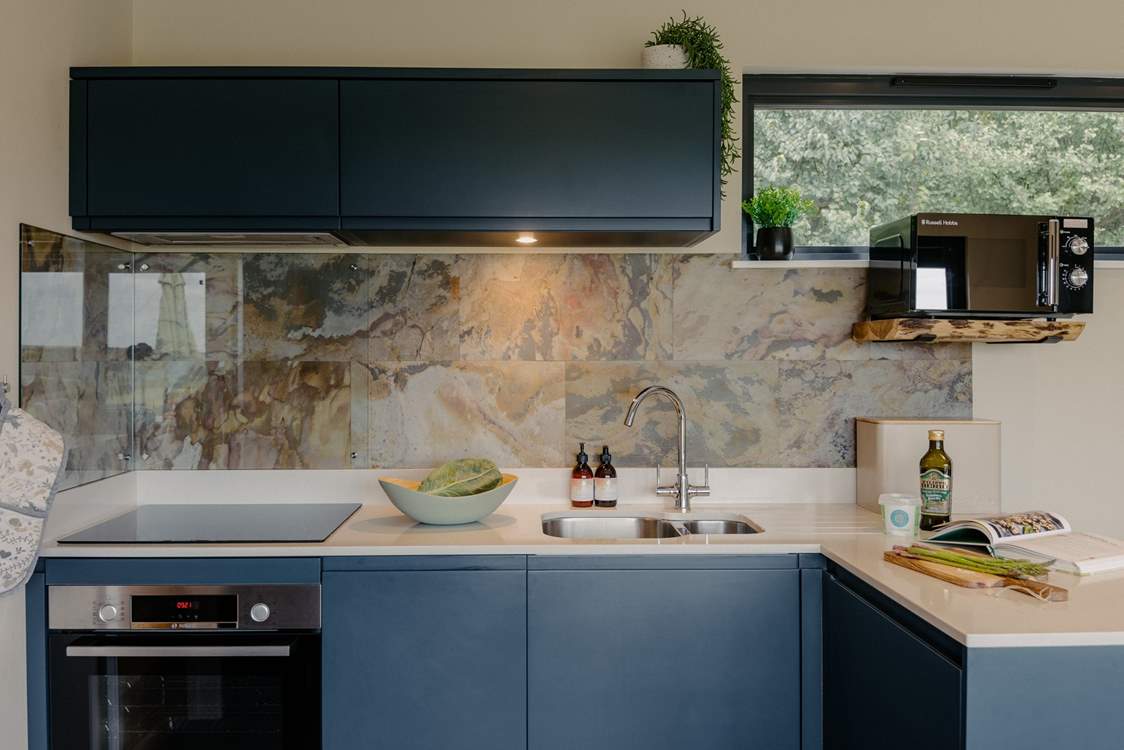 The fully equipped kitchen is ideal for those family meal times.