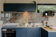 The fully equipped kitchen is ideal for those family meal times.