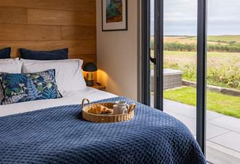 Sink into the sumptuous king-sized bed and admire the far-reaching views.