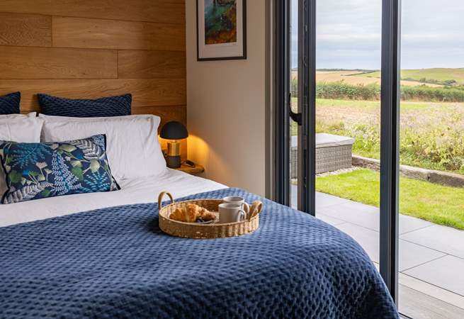 Sink into the sumptuous king-sized bed and admire the far-reaching views.