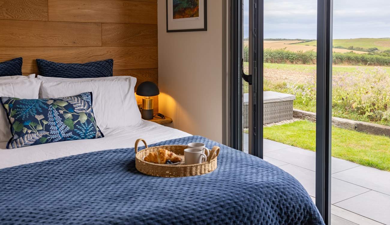 Sink into the sumptuous king-sized bed and admire the far-reaching views.