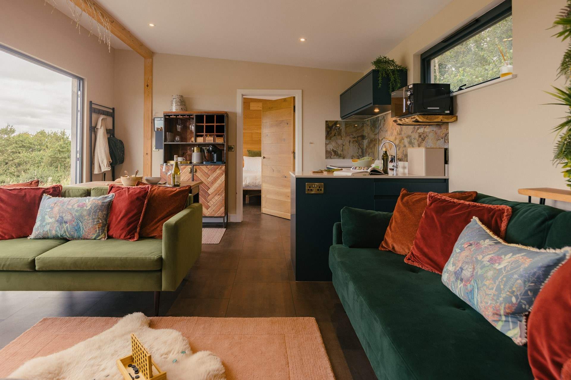 Gorgeous interiors are complemented by rich jewel coloured furnishings.