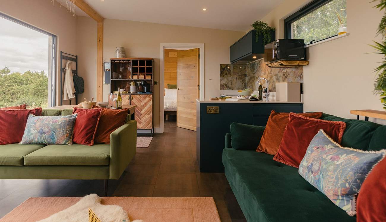 Gorgeous interiors are complemented by rich jewel coloured furnishings.
