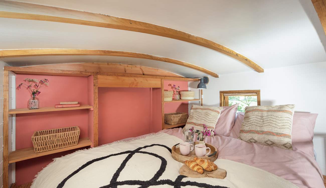Climb the ladder to reach the snug mezzanine style bed (please take care on the ladder).