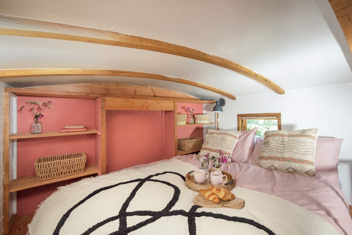 Climb the ladder to reach the snug mezzanine style bed (please take care on the ladder).