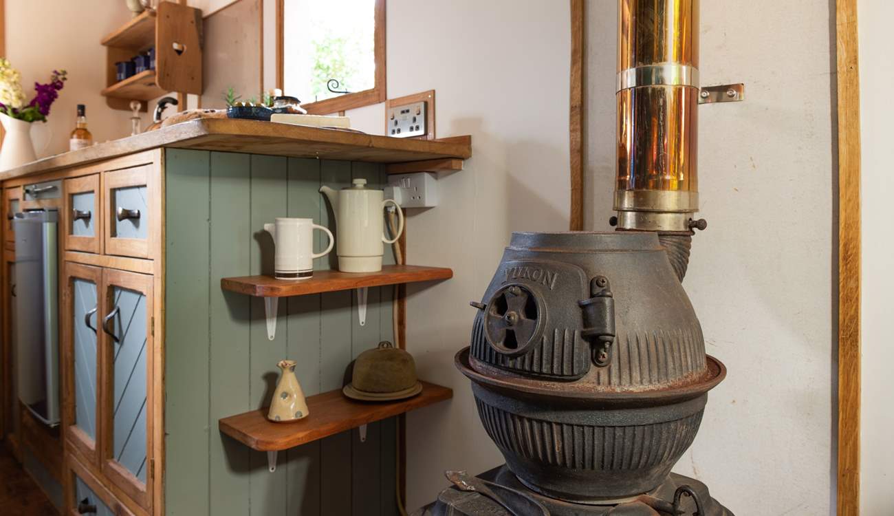 The rustic wood-burner is a unique feature. 