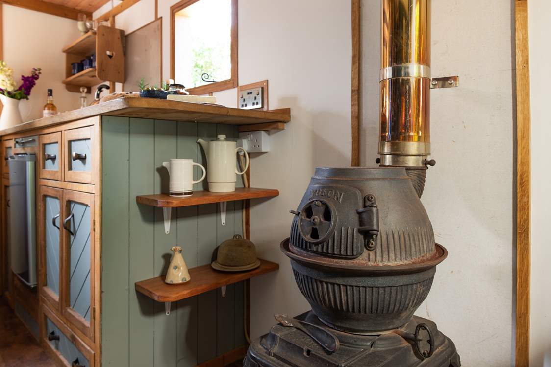 The rustic wood-burner is a unique feature.