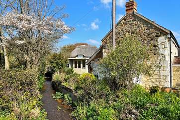 Follow those pooh sticks through the grounds at Weirside Cottage.