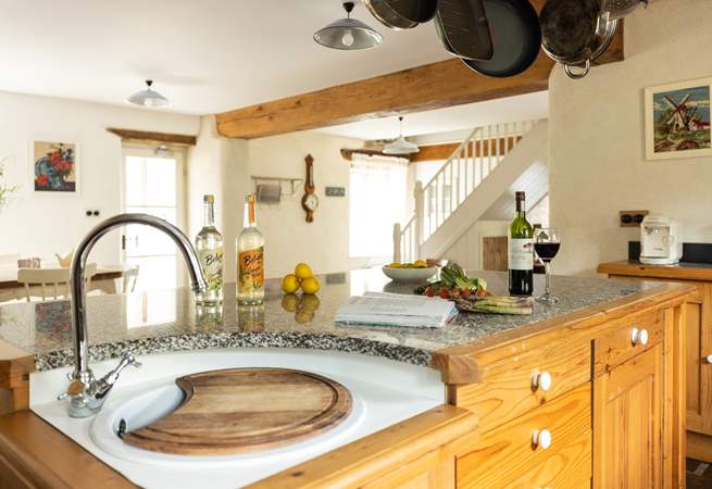 A kitchen island completes this kitchen along with a second sink!
