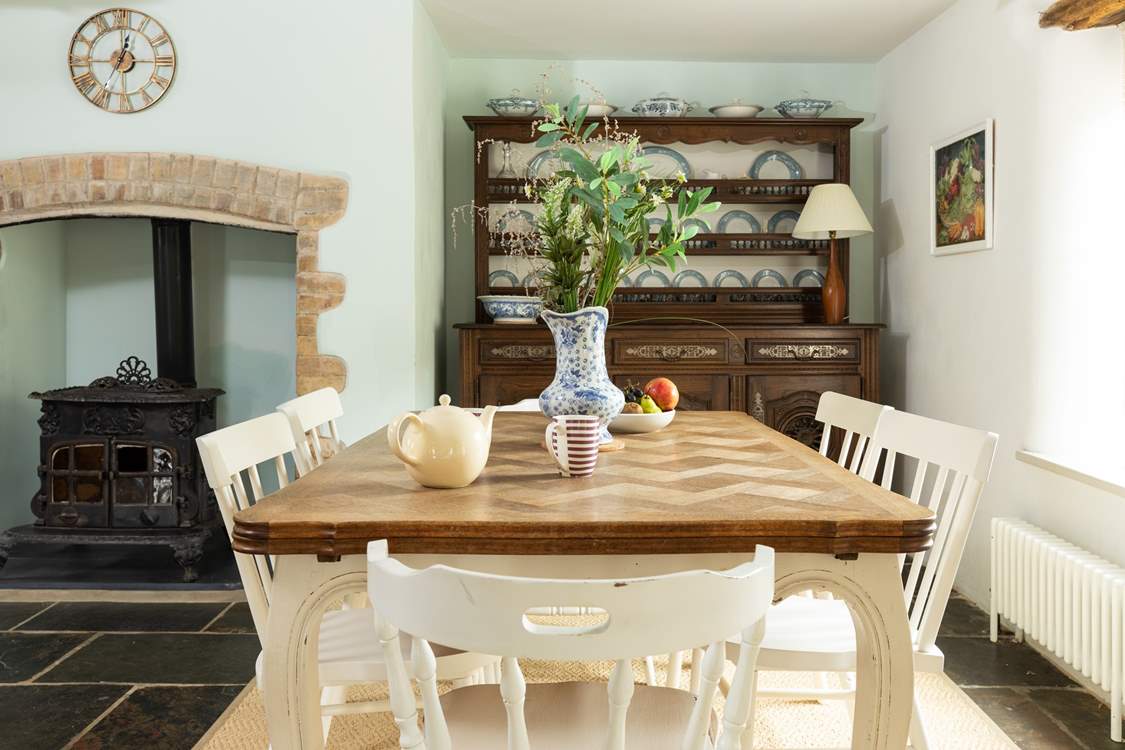 A lovely spot to enjoy breakfast whilst the children sleep. Please note this fireplace is ornamental.