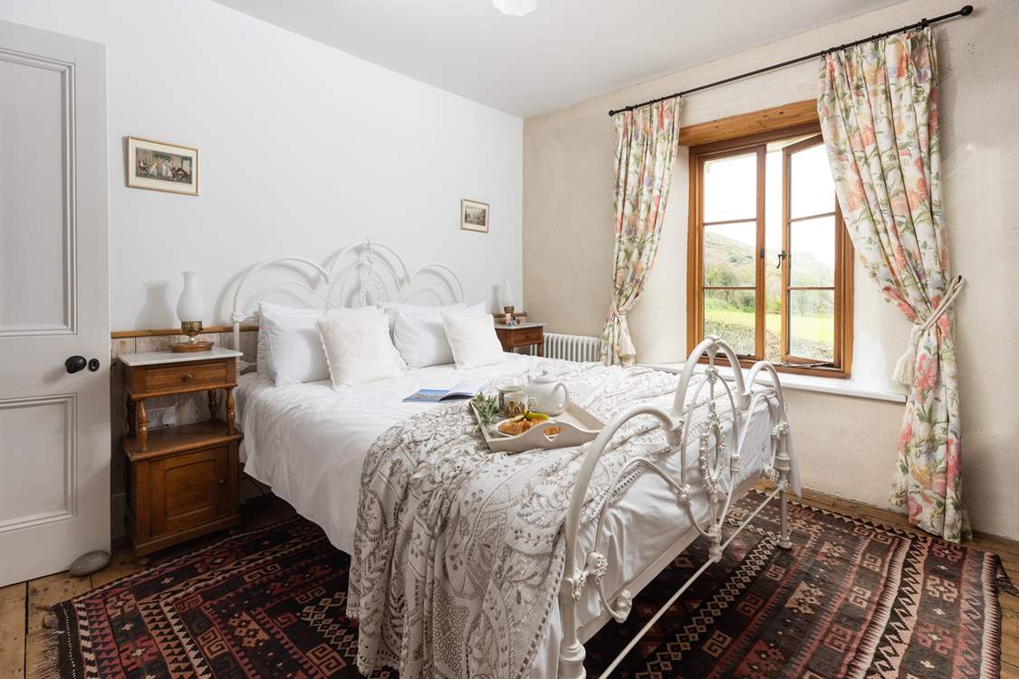 Bedroom two, with an en suite shower-room, enjoys a lovely outreach to the front of the house.