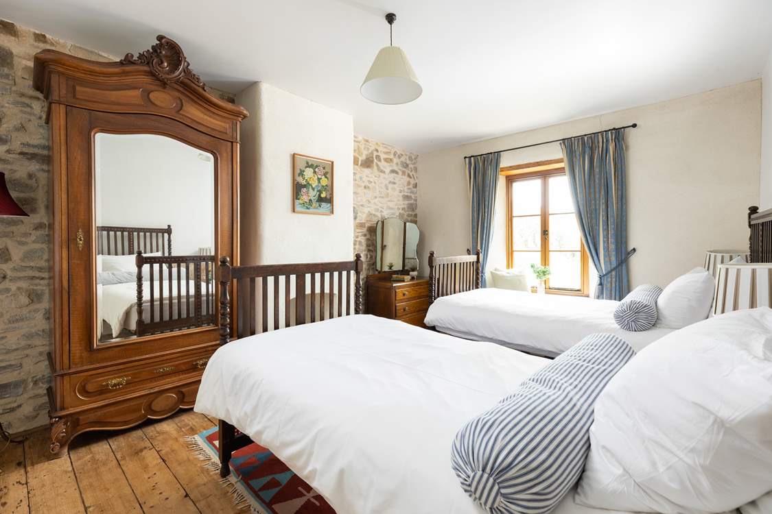 Bedroom one offers a lovely twin with gorgeous furniture.