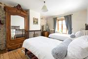Bedroom one offers a lovely twin with gorgeous furniture.