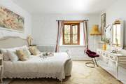 A bedroom that you will look forward to retreating to to!
