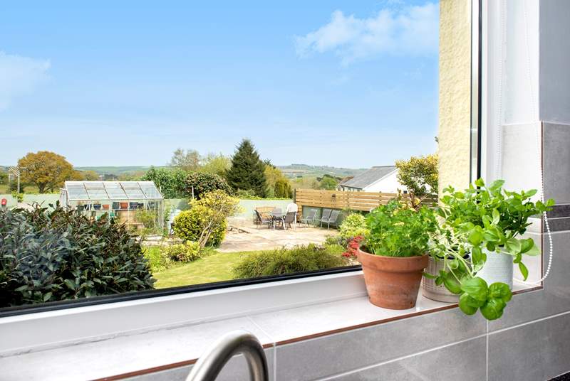 From the kitchen you can enjoy the view over the back gardens that certainly makes the most of the views.