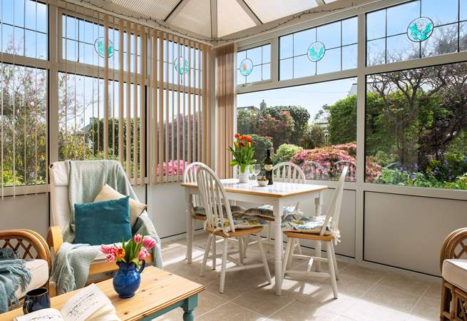 From the sunny conservatory you can look out over the front garden.....