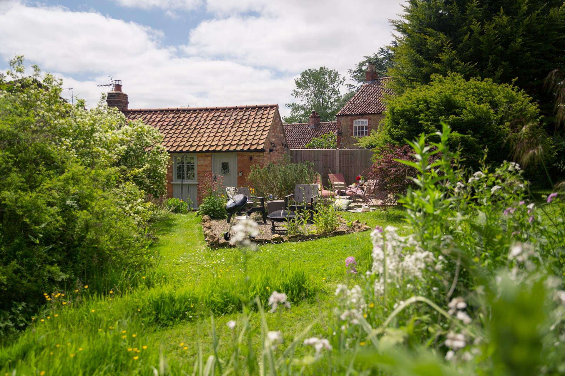 Welcome to the tranquil garden of Pheasant Cottage.