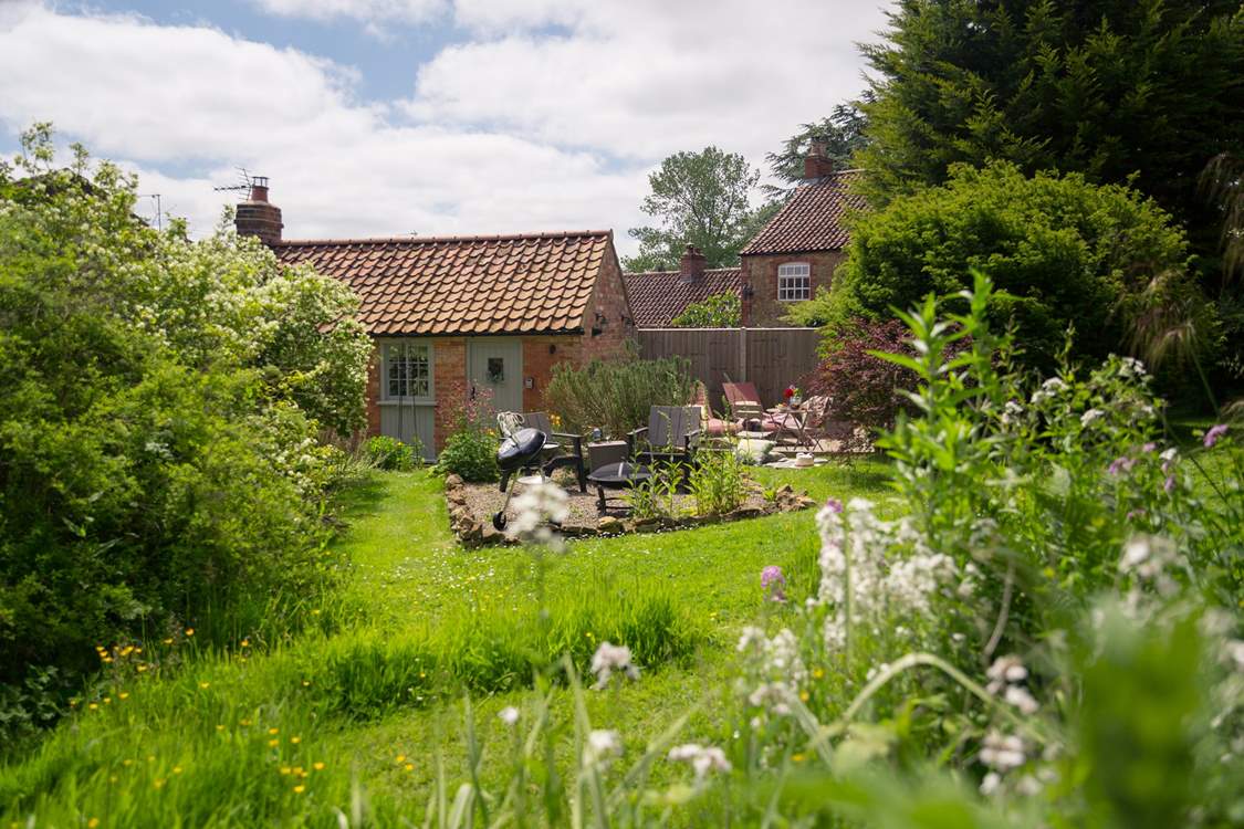Welcome to the tranquil garden of Pheasant Cottage.