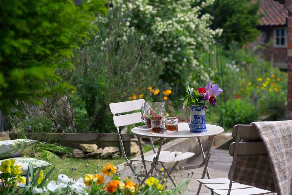 Enjoy a drink at the bistro table for two.