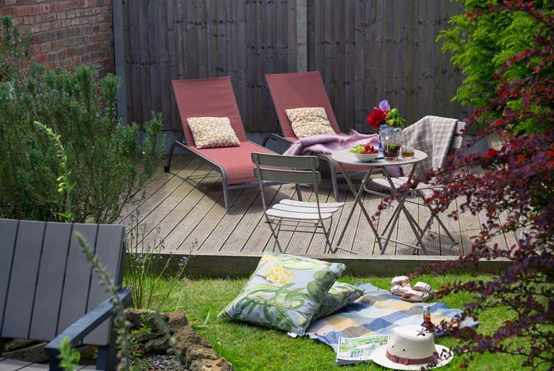 The patio and garden provide the perfect place to relax.