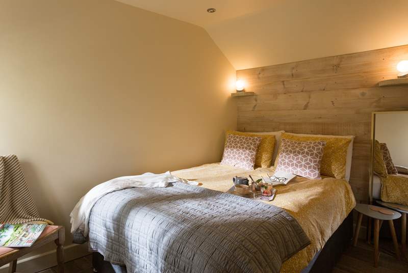 A beautiful cosy bedroom to rest your head after a day out sightseeing.