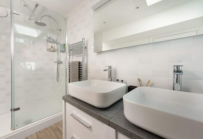 Twin sinks for that added bit of luxury and a separate enclosed shower.