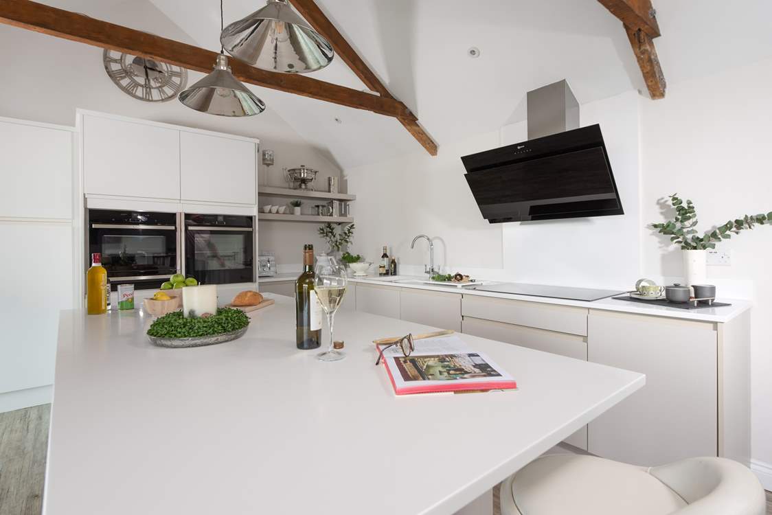 Preparing holiday meals will be a delight and those not cooking can keep the designated chef entertained perched up at the breakfast-bar.