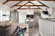 This lovely riverside home is a light, joyful space perfect for couples or families looking to explore beautiful south east Cornwall.
