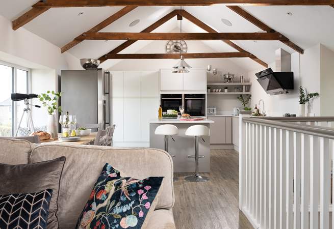 This lovely riverside home is a light, joyful space perfect for couples or families looking to explore beautiful south east Cornwall.