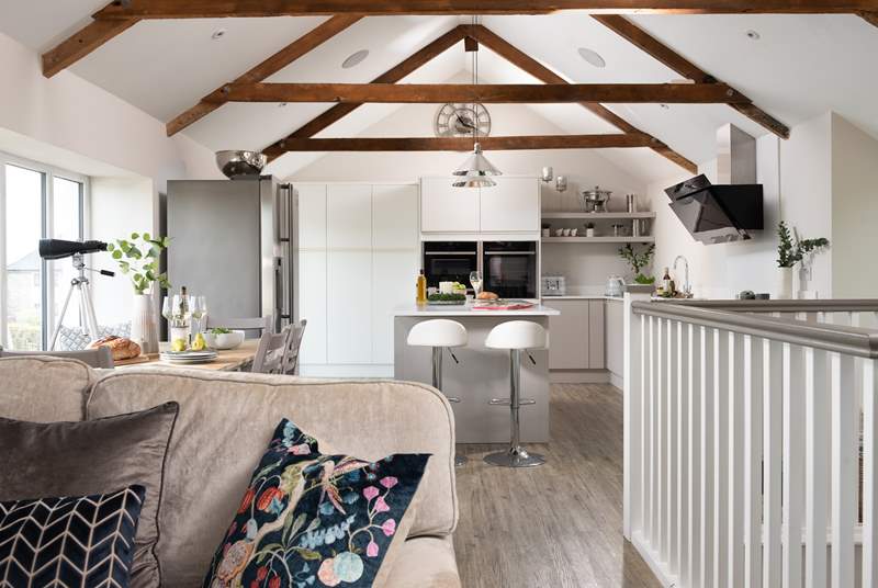 This lovely riverside home is a light, joyful space perfect for couples or families looking to explore beautiful south east Cornwall.