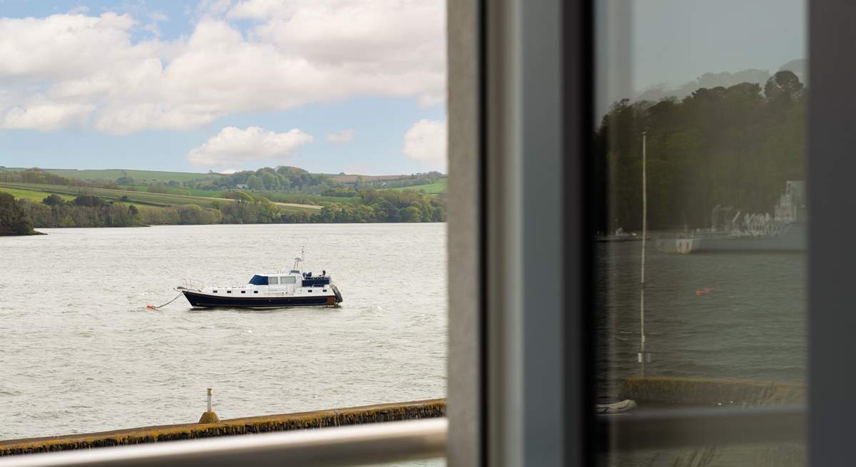 Far reaching views across the water to the lush countryside beyond.