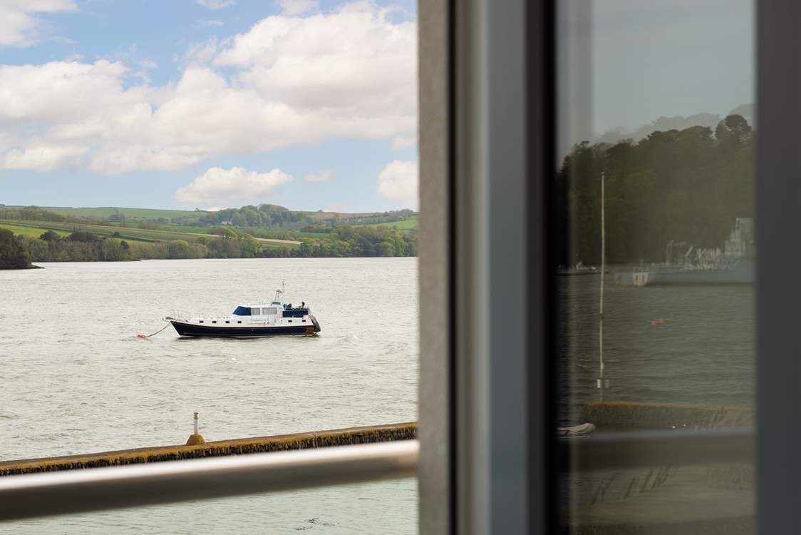 Far reaching views across the water to the lush countryside beyond.
