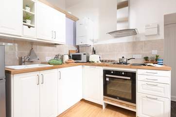 The well appointed kitchen has everything you need.