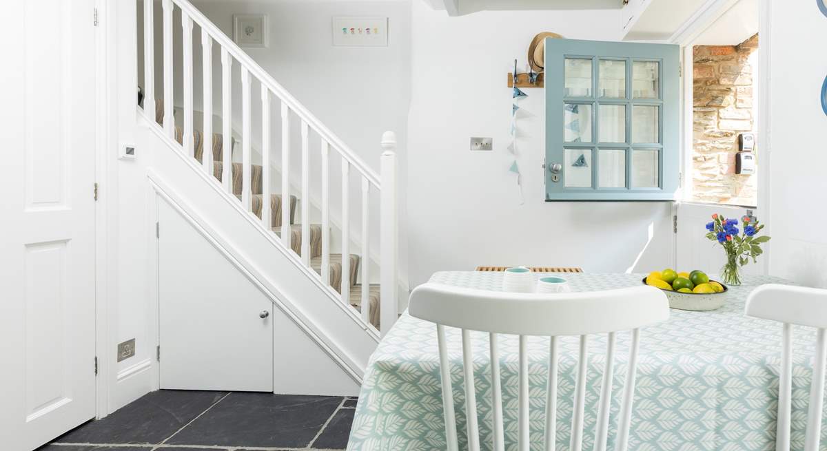 The stairs lead to the first floor bedrooms and family bathroom.