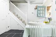The stairs lead to the first floor bedrooms and family bathroom.